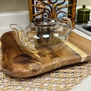 Glass and stainless steel infusing tea pot.